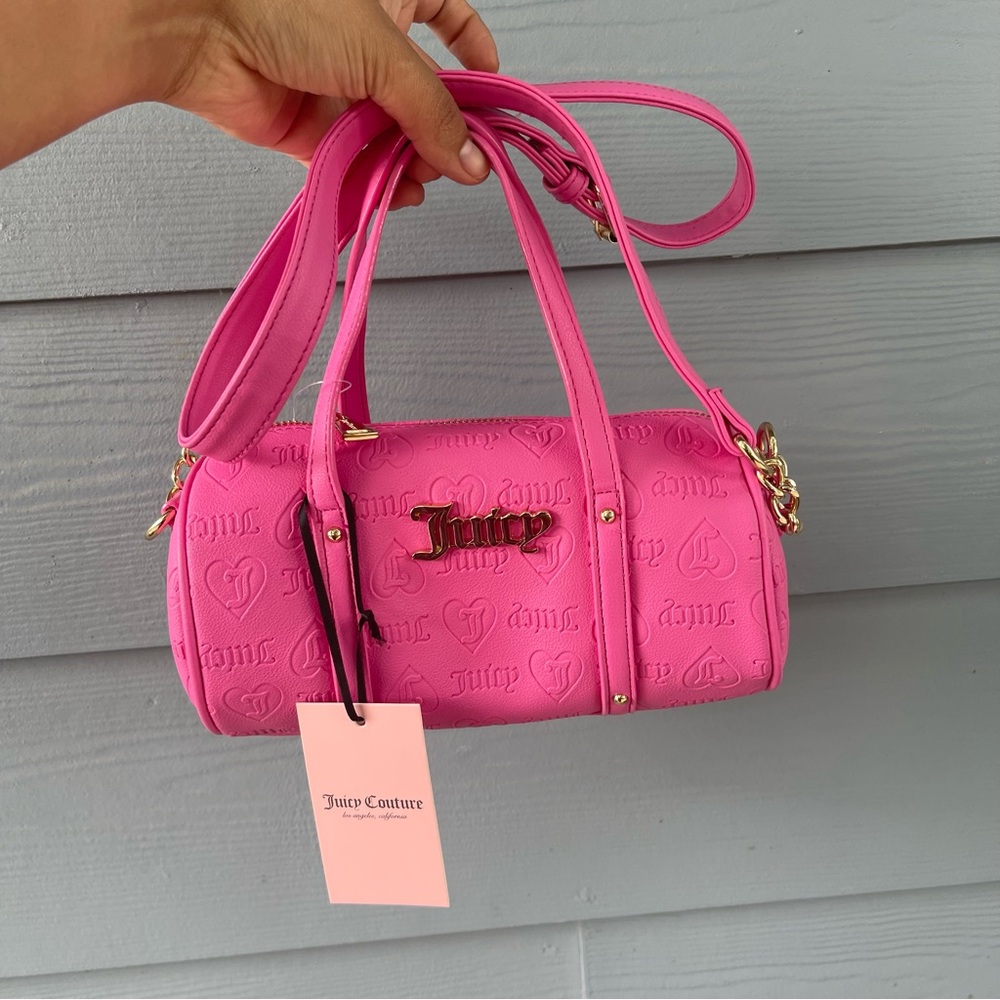 NWOT Juicy Couture Juicy Pink barrel bag
New WITHOUT tags